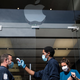A security guard checked a customer’s temperature outside an Apple Store in Charleston, South Carolina in May.